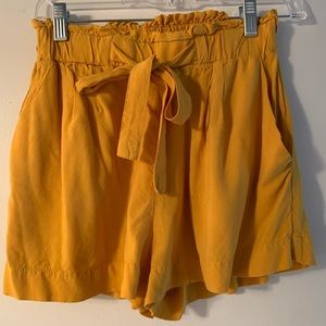 Small yellow tie- waist shorts